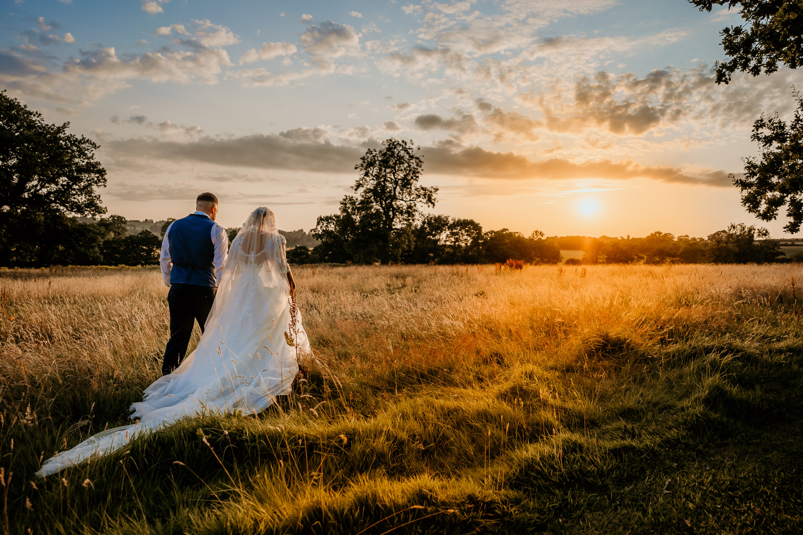 bride and groom sunset wedding at Shottle Hall