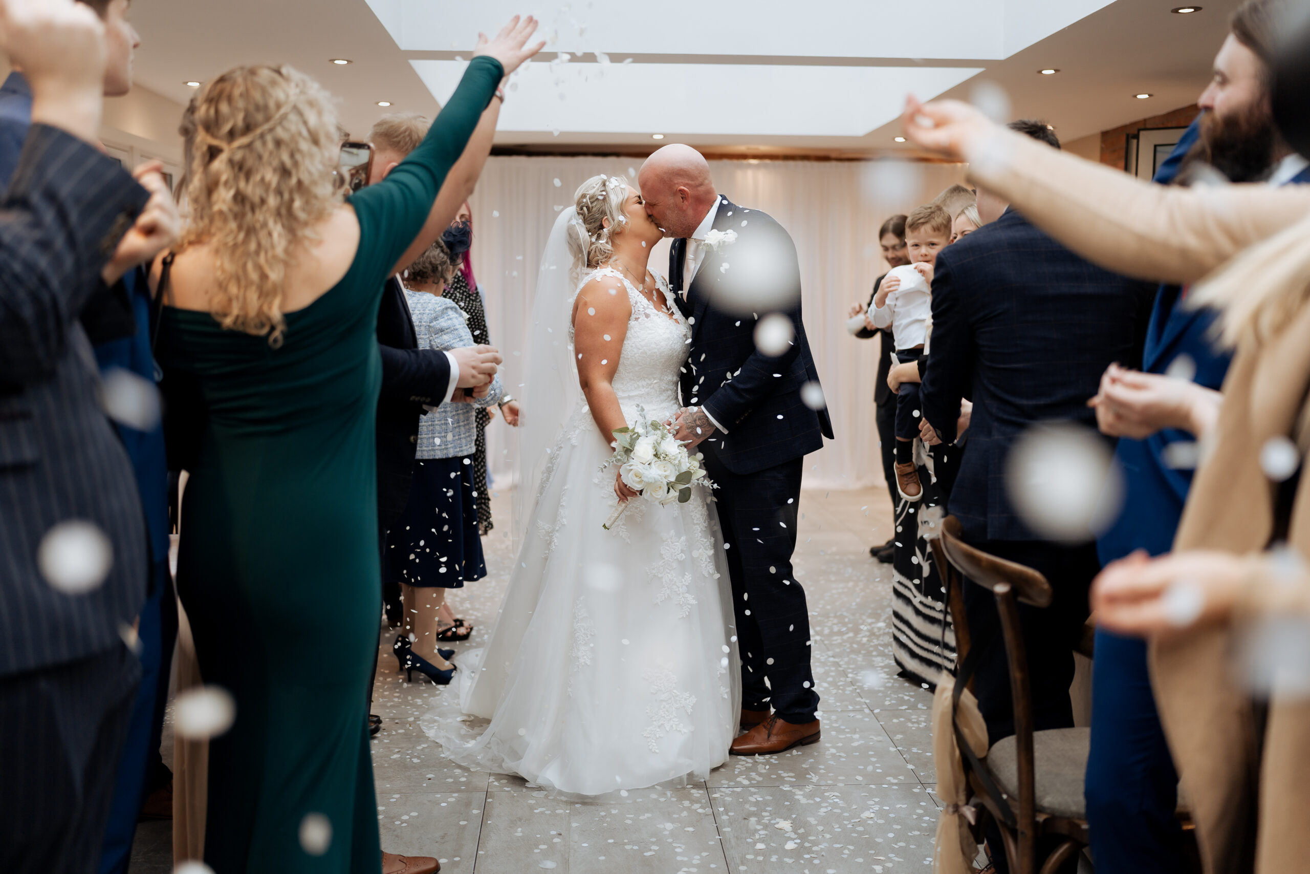 Bride and groom confetti at white hart Inn Wedding