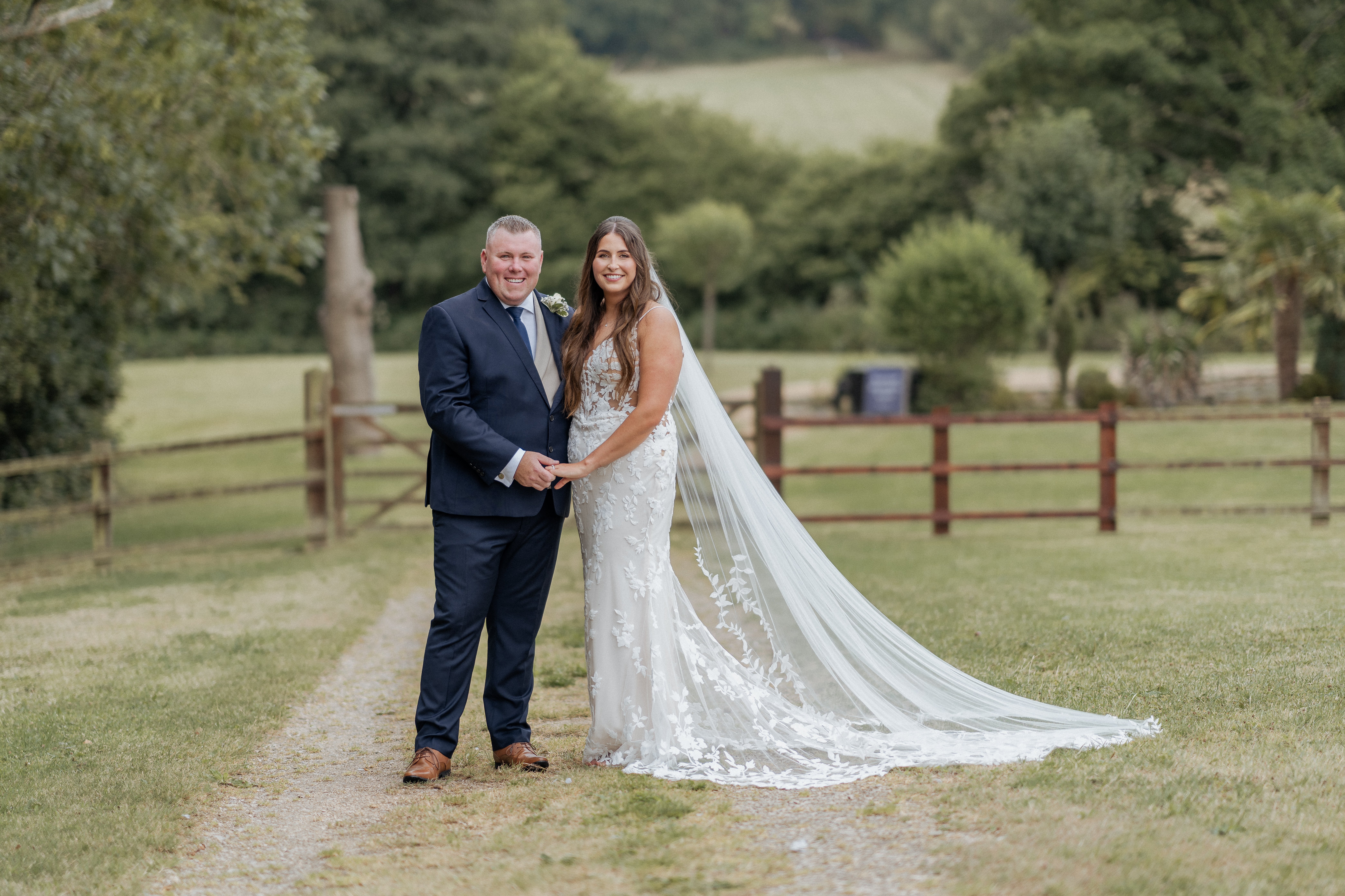 Bride and groom holding hands