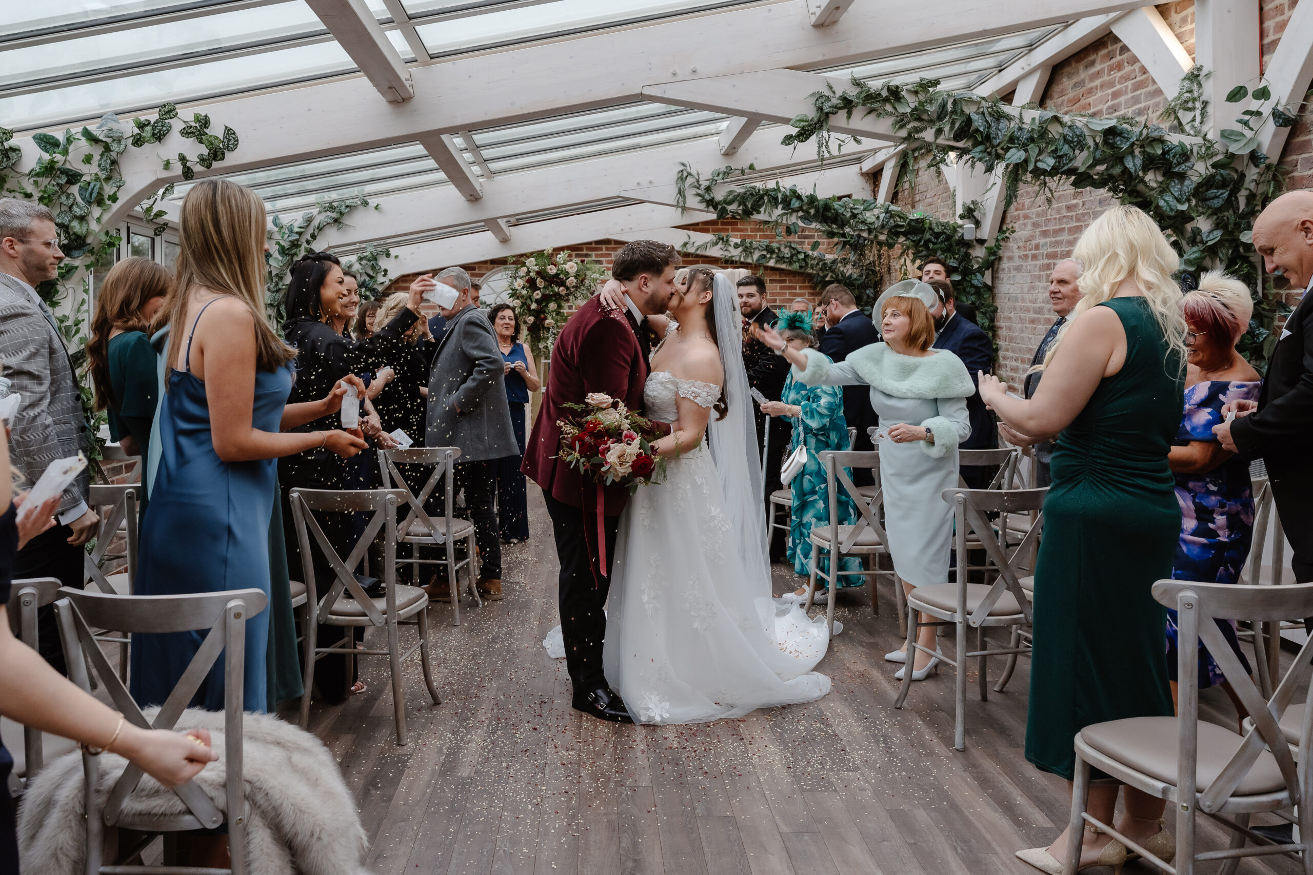 Bride and Groom kissing at Foxtail barns wedding venue